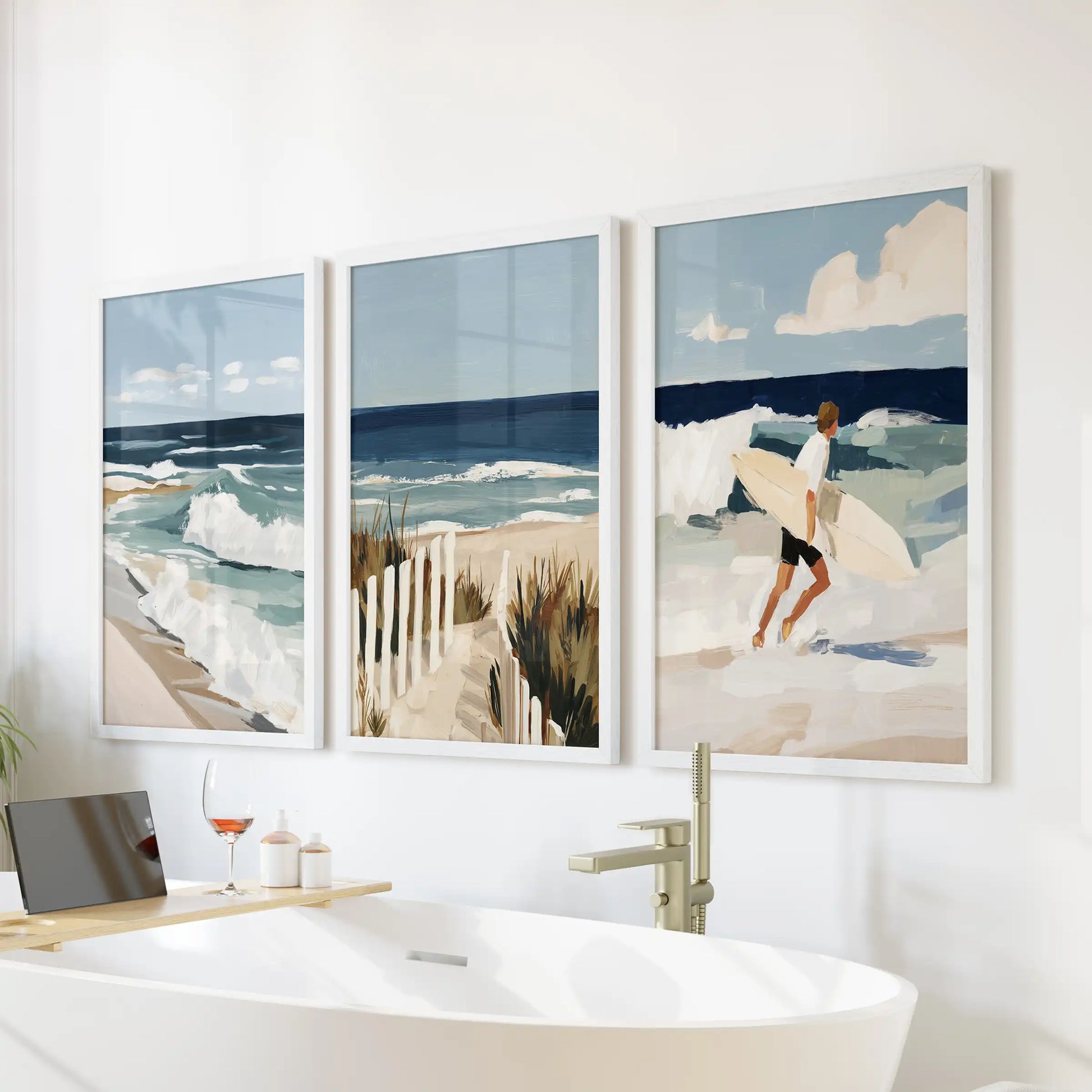 Ocean wave framed prints, 3-piece picture set, soothe a bathroom scene in white frames, perfectly placed above the freestanding tub.