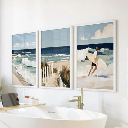 Ocean wave framed prints, 3-piece picture set, soothe a bathroom scene in white frames, perfectly placed above the freestanding tub.