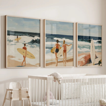Light-oak framed beach prints, set of three, soothe the baby room above the crib with gentle seaside color and calm tone.