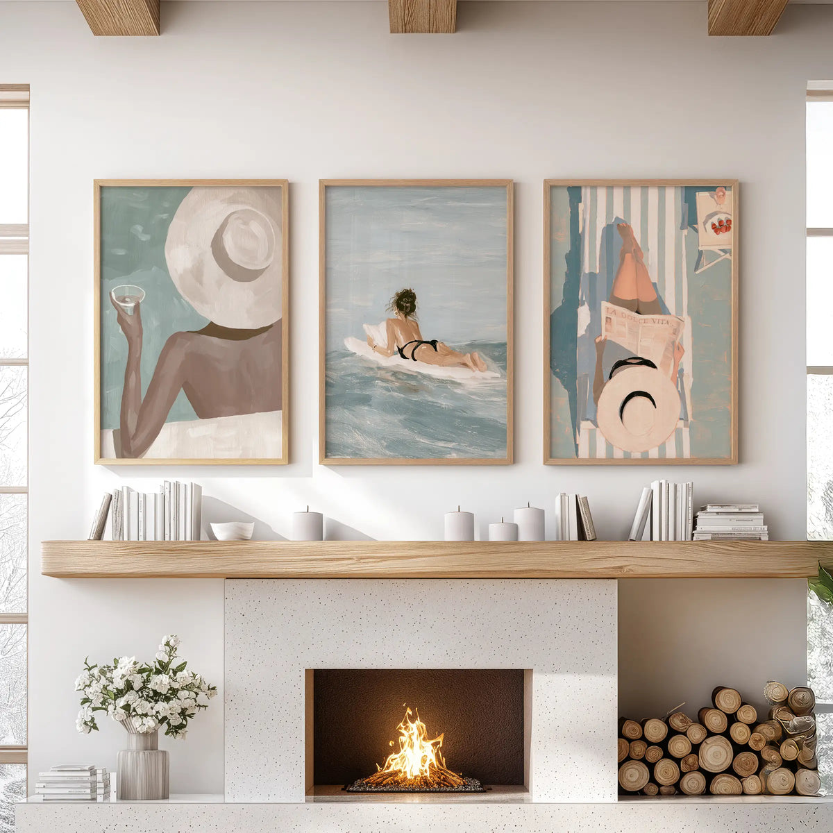 Summer surf set of three wall decor prints appears in oak frames above the mantel in a lounge.