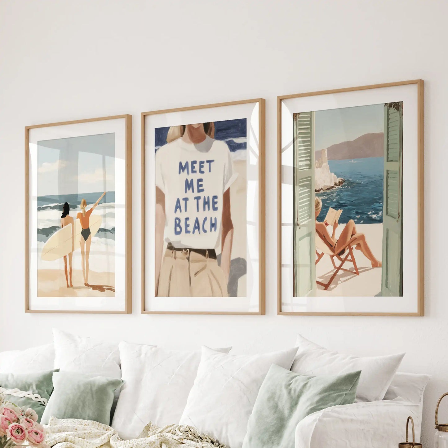 Surf girl on the beach, a set of 3 wall art prints matted in natural oak frames, placed behind the couch in the lounge for an effortless, sun-kissed touch.