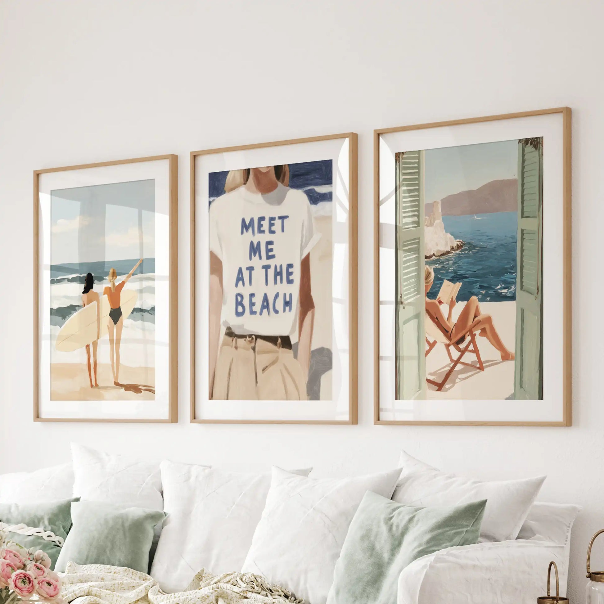Surf girl on the beach, a set of 3 wall art prints matted in natural oak frames, placed behind the couch in the lounge for an effortless, sun-kissed touch.