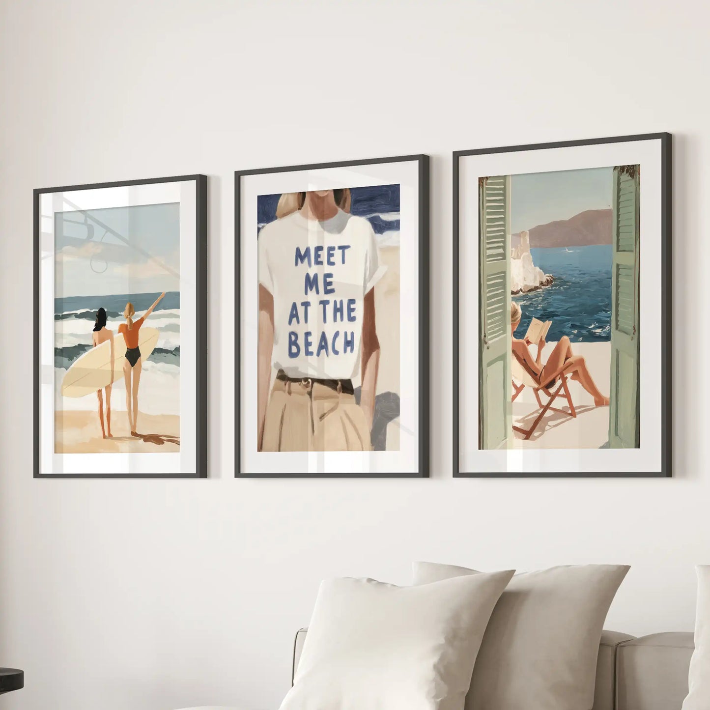 Italian coast shoreline, a three-piece wall art set in black frames with matting, arranged over the couch in the family room for a sunlit, escapist feel.
