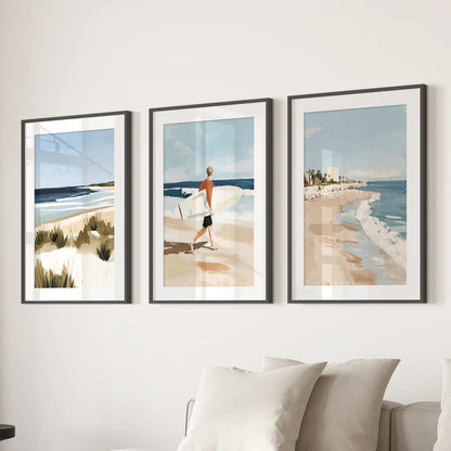Black-matted surfer posters, a set of three, hang above the lounge sectional and create a laid-back beach energy in the space.