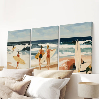 Surfer girl wall art 3-piece canvas set, gallery-wrapped for a clean edge, centers the bedroom above the bed with confident, sunlit surf energy.