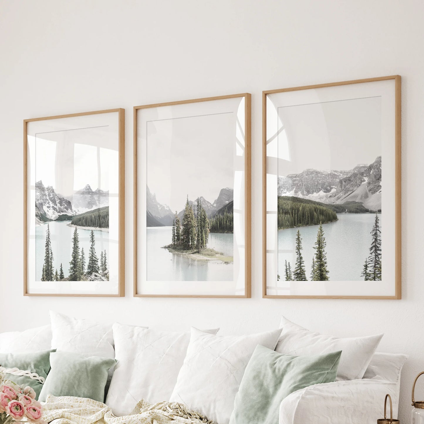 Maligne Lake panorama, a 3-print wall set hung over the sofa, arrives in wood frames with mats to bring cool blues and spacious depth to the sitting room.