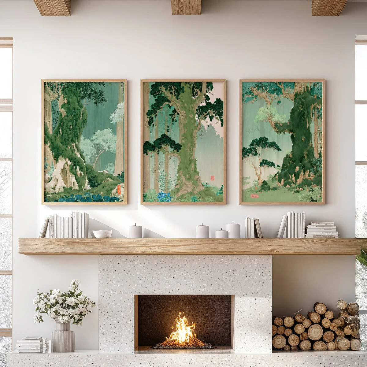 Woodland landscape wall art, a three-piece set in light oak frames, hangs over the mantle in the lounge.