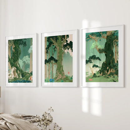 A set of three woodland landscape pictures in white matted frames hangs on the bedroom wall next to the bed.
