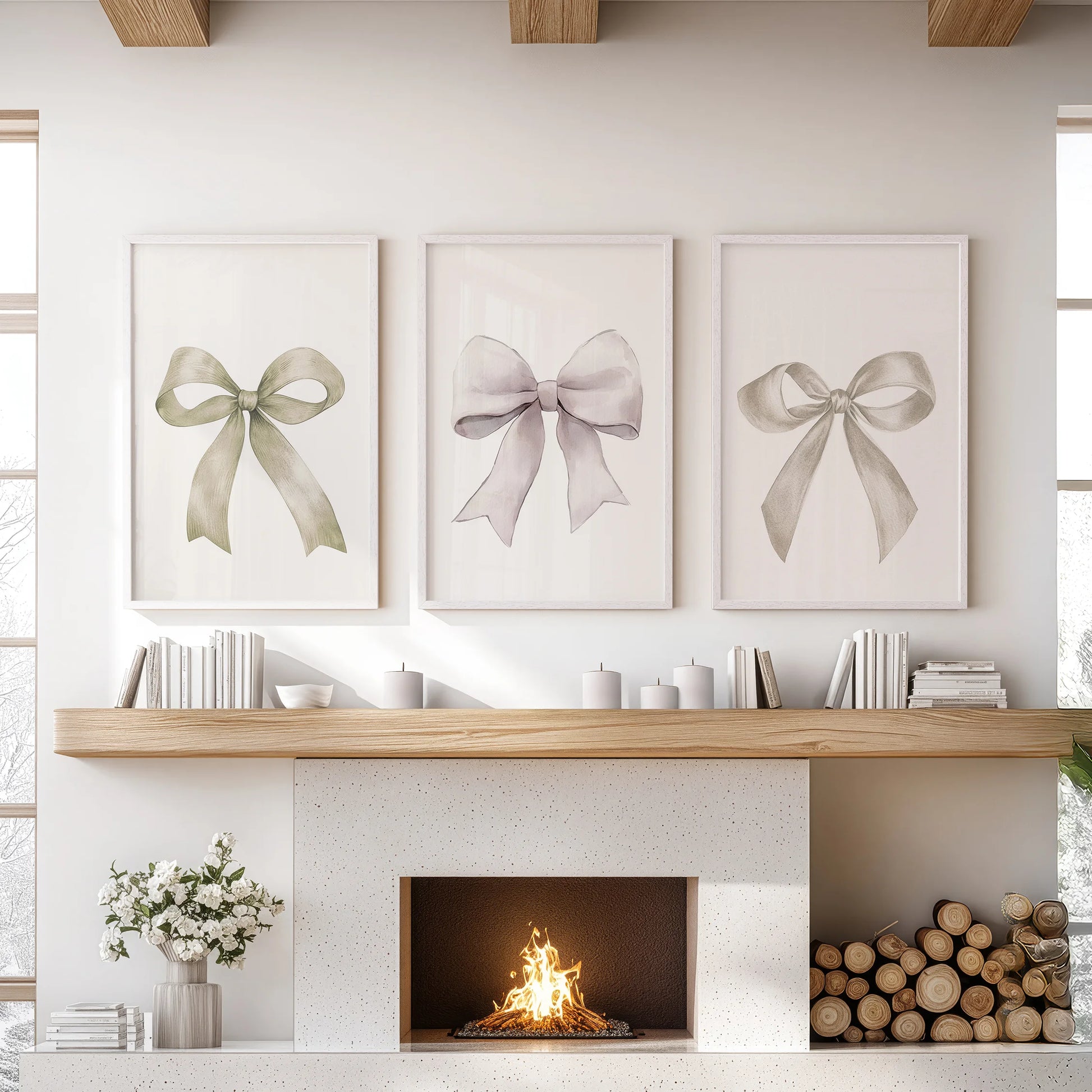 Bow motif wall art, a set of three, hang above the lounge hearth in crisp white frames, adding graceful ribbon shapes to a relaxed, airy setting.