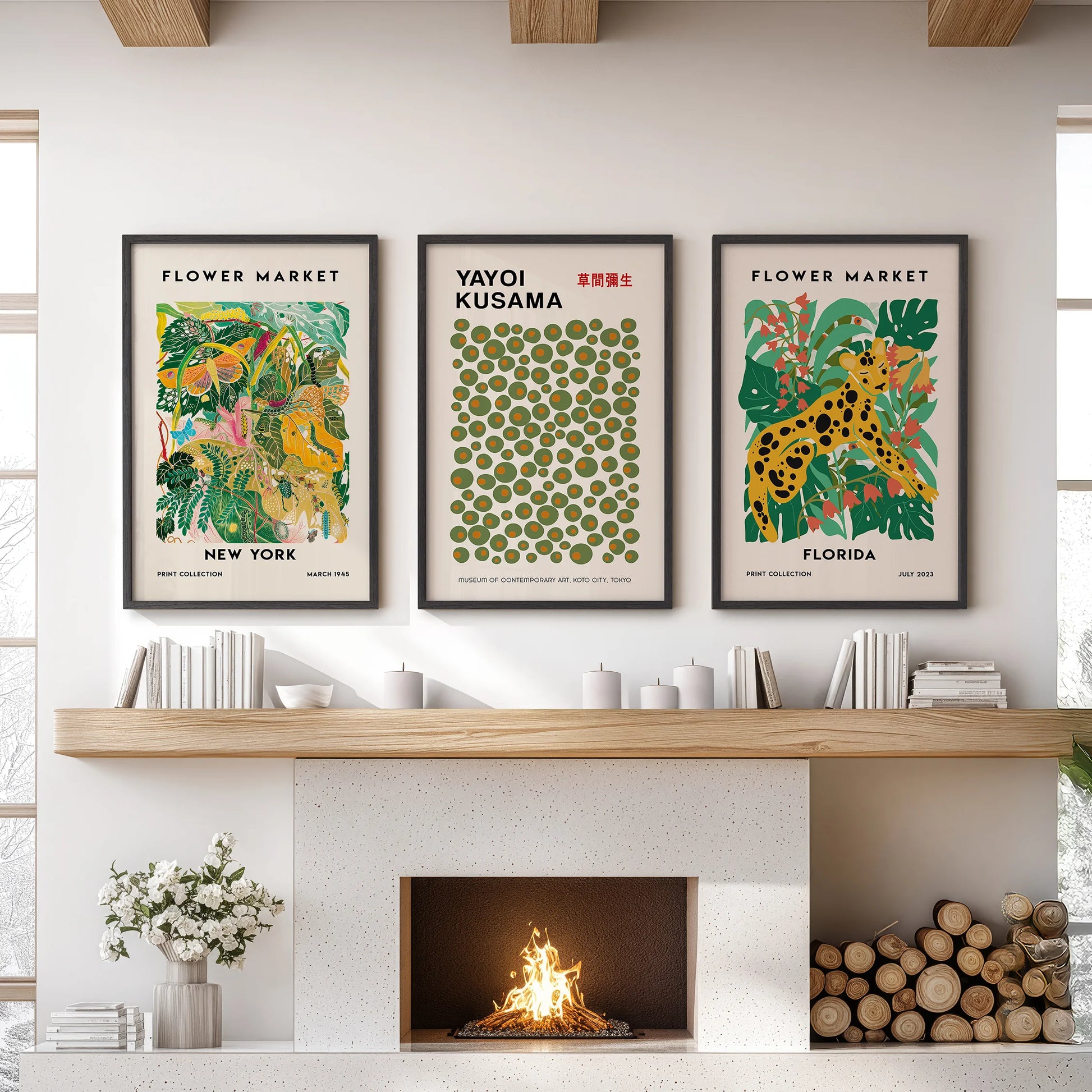 Green vintage botanical wall art, a three-print set, hangs in sleek black frames above the sitting room mantel to bring a collected, gallery feel.