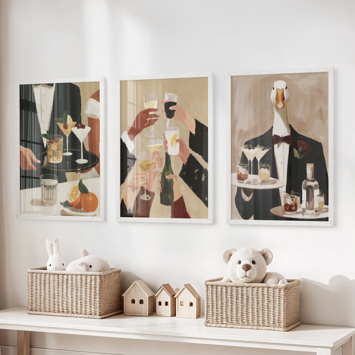 Vintage cocktail bar wall art in a three-piece set, white framed above a storage bench in a kids room.