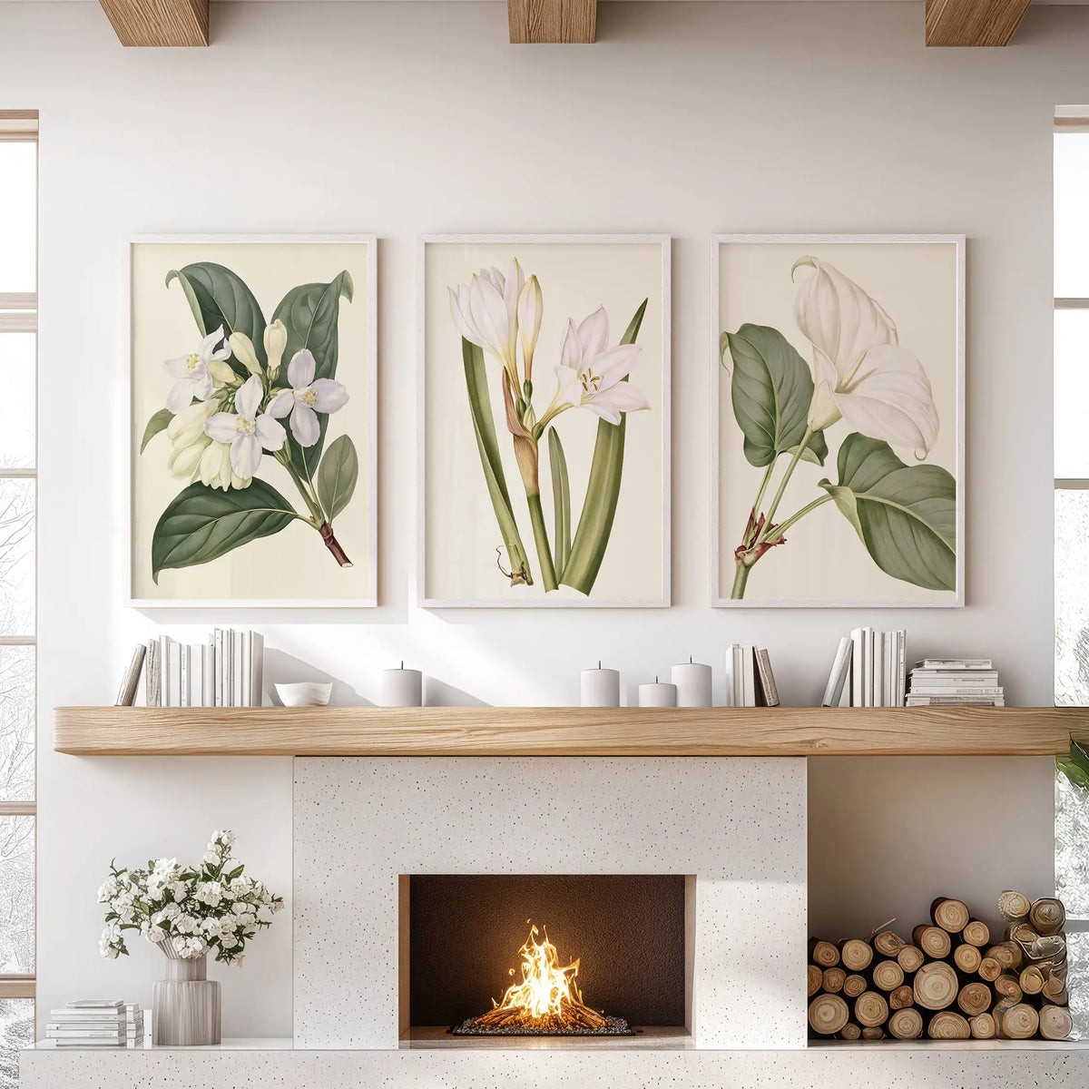 White flower studies hang in three white frames above a fireplace.