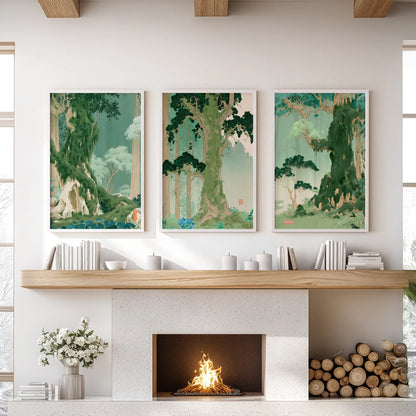 A three-piece vintage Japanese forest picture set in white frames hangs above the fireplace in a sitting room.