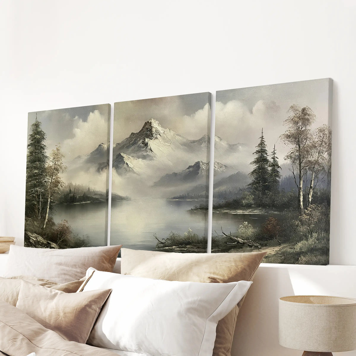Vintage landscape painting three-piece wall artwork on stretched canvas, arranged above the headboard in a bedroom.
