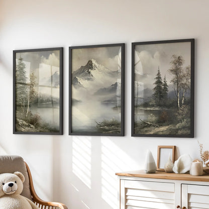 Vintage landscape painting three-piece wall art set in black frames, hung above a dresser in a kids room.