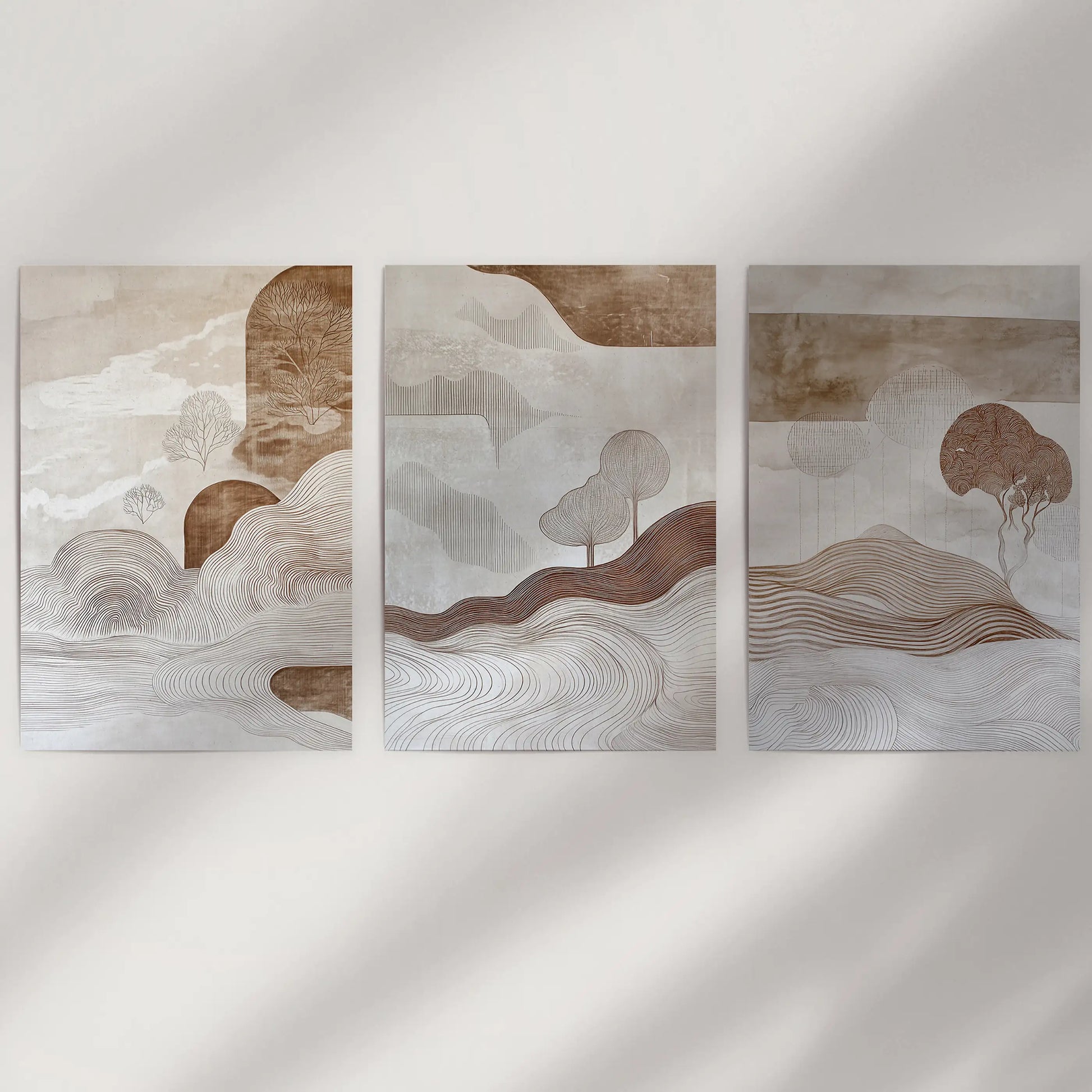 Minimalist wall prints in a beige and brown trio arrive unframed, creating a clean, airy display that suits a pared-down space.