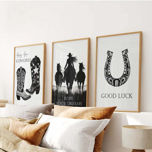 Western fashion icon prints in a 3-piece art set sit in solid oak frames, styling the bedroom over the headboard with textured, ranch-bred polish.