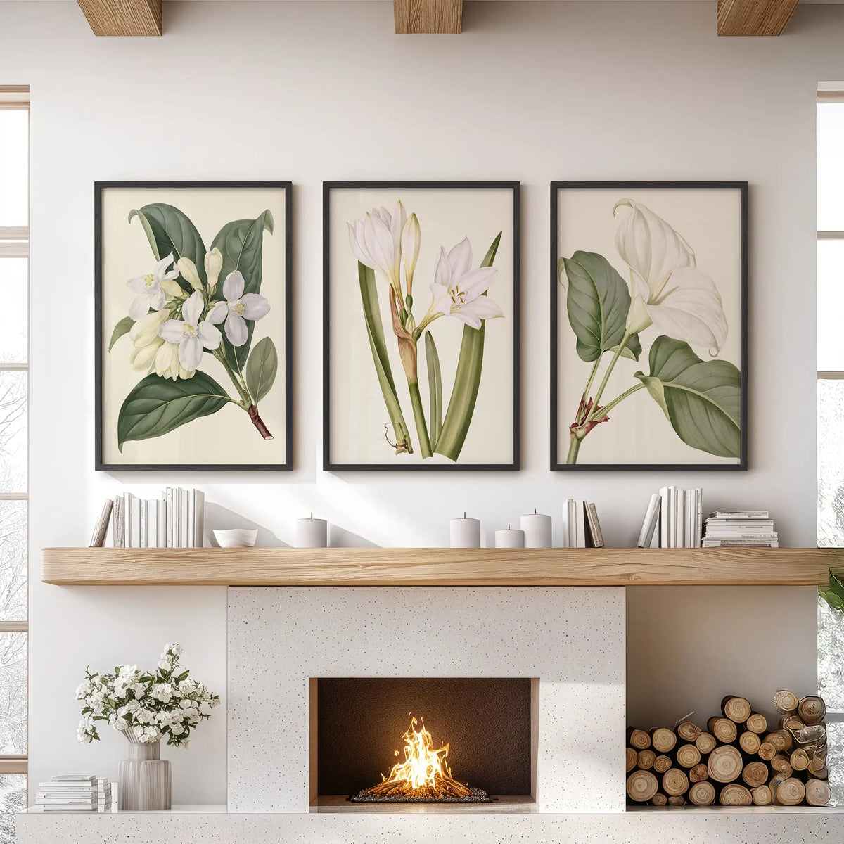 White blossoms and green leaves fill three black-framed prints above a fireplace.