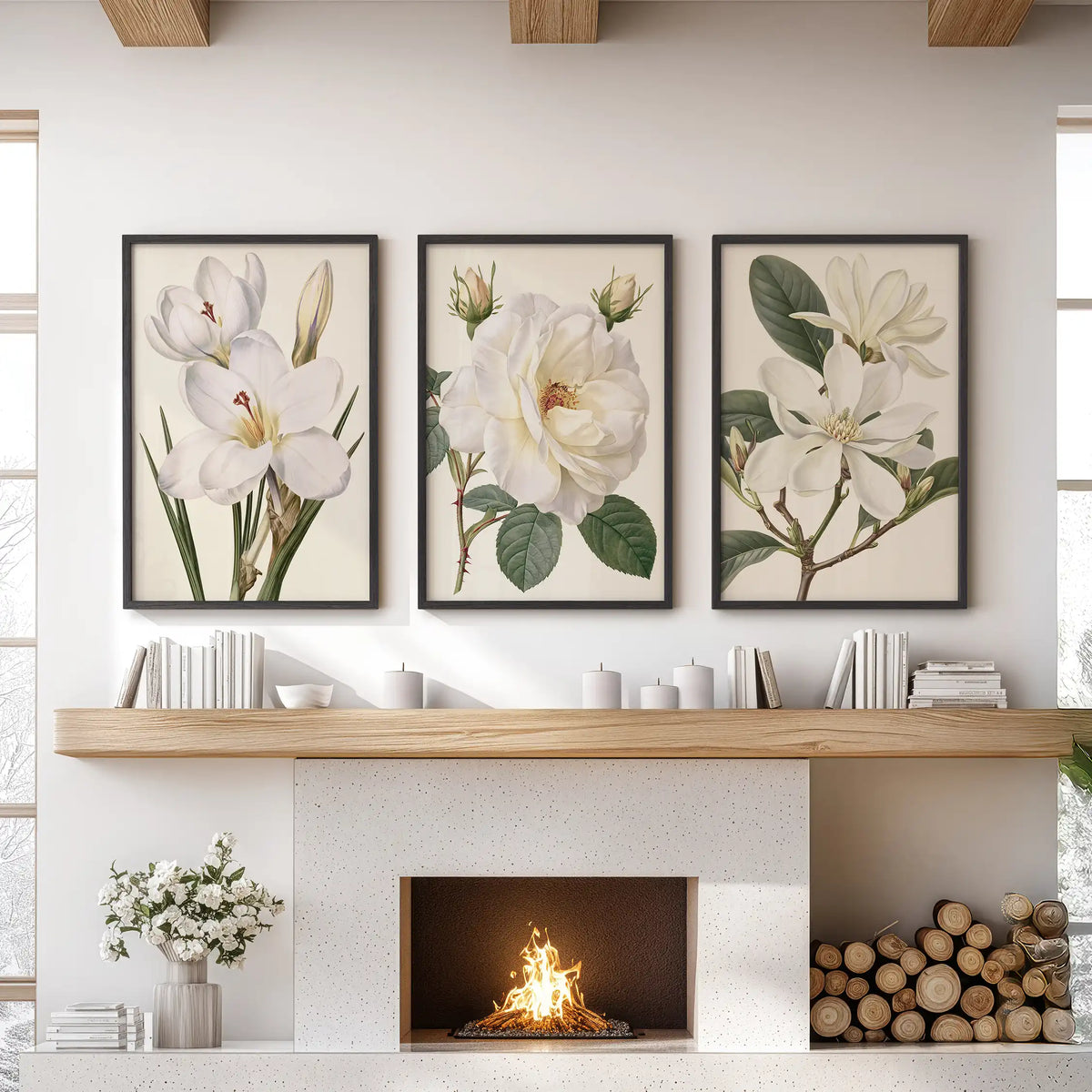 A layered white rose sits between two other white flower studies in three black-framed prints above a fireplace, all on cream backgrounds.