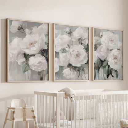Peony bouquet botanicals in a gallery wall of three, light oak frames perched over the nursery crib to soften the space with tender, creamy blooms.