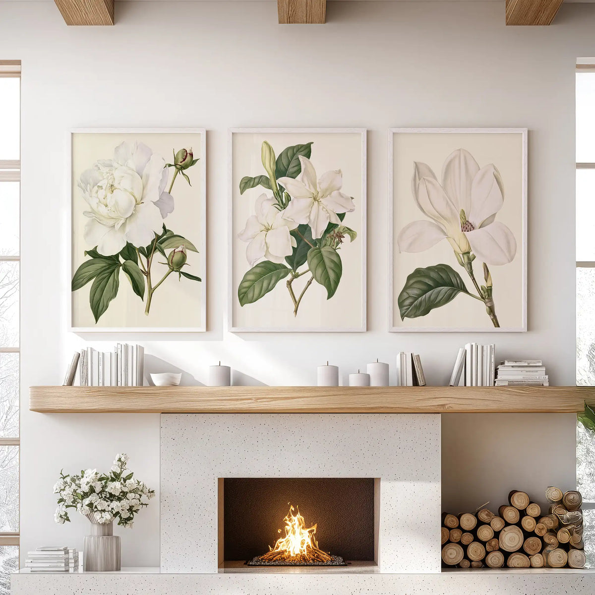 Cream backgrounds remain visible around white petals and deep green leaves in three white-framed prints above a fireplace.