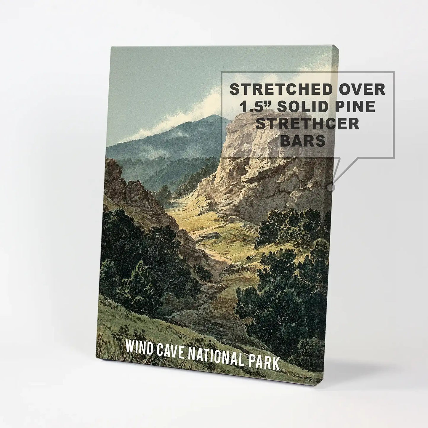 Moody earth-tone wilderness wall art piece on stretched canvas brings layered rock forms and dark pines into view with a soft, retro travel feel.