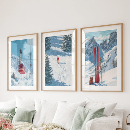Ski resort scene wall decor, 3-piece set in natural oak frames with mats, sits above the sitting room sofa and adds crisp alpine air.