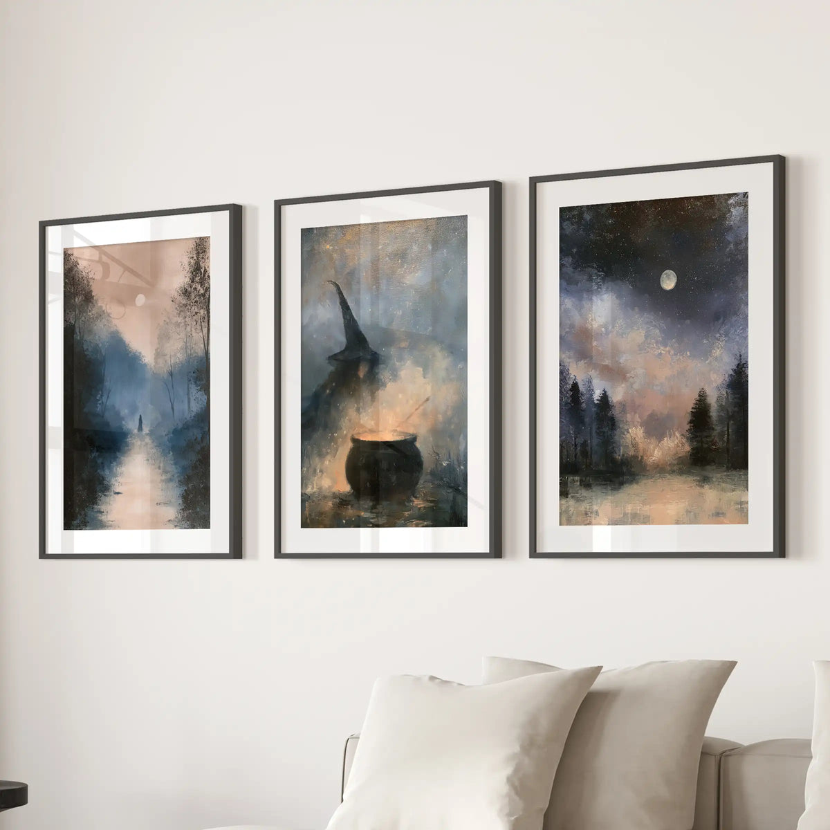 Three witch silhouette wall art pieces, matted in black frames, hang over the sofa for a relaxed sitting room display.