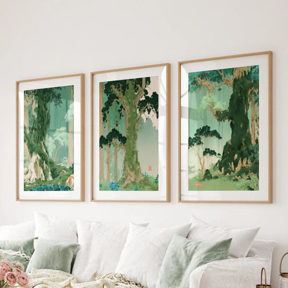 Woodblock-style landscape wall art, a set of three posters in matted wood frames, hangs behind the sofa in the lounge.
