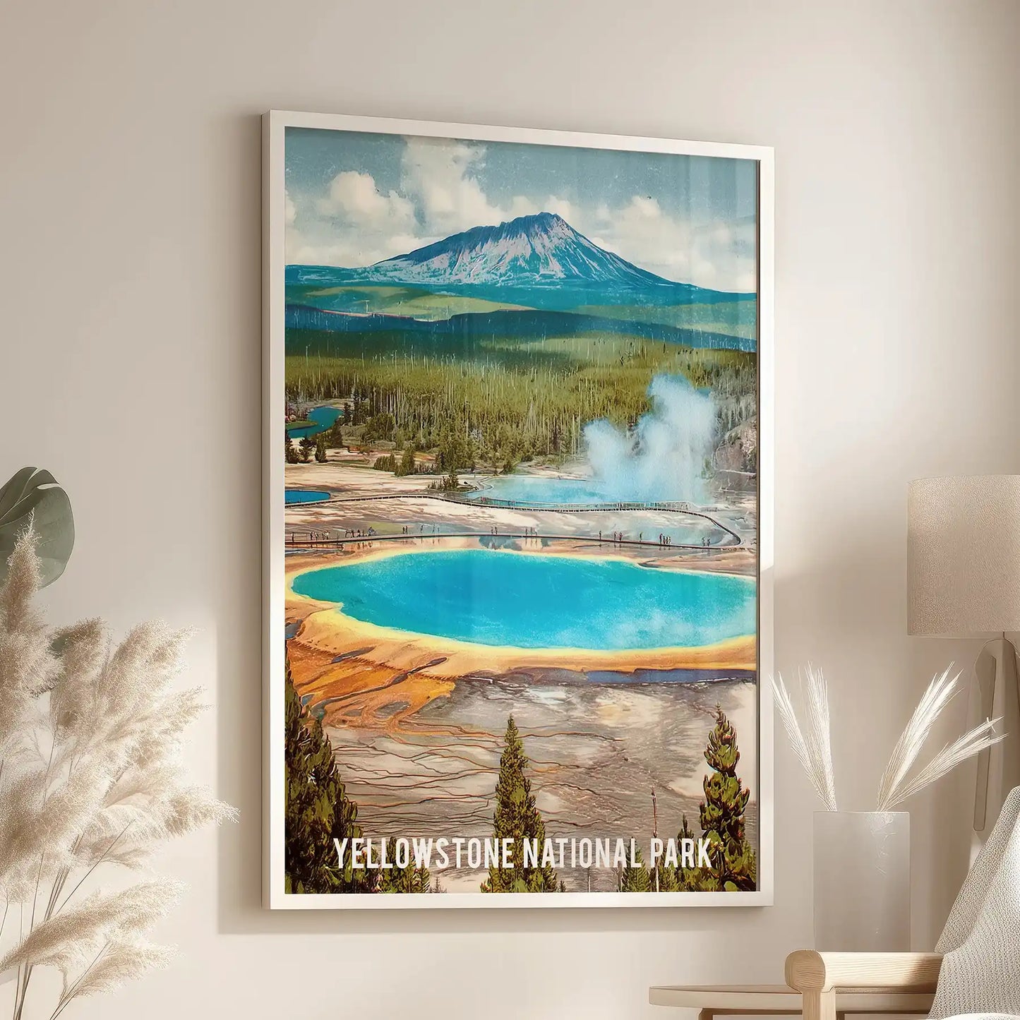 Clean and crisp, a white-framed Yellowstone landscape poster adds fresh national park scenery above an accent chair in the living room.