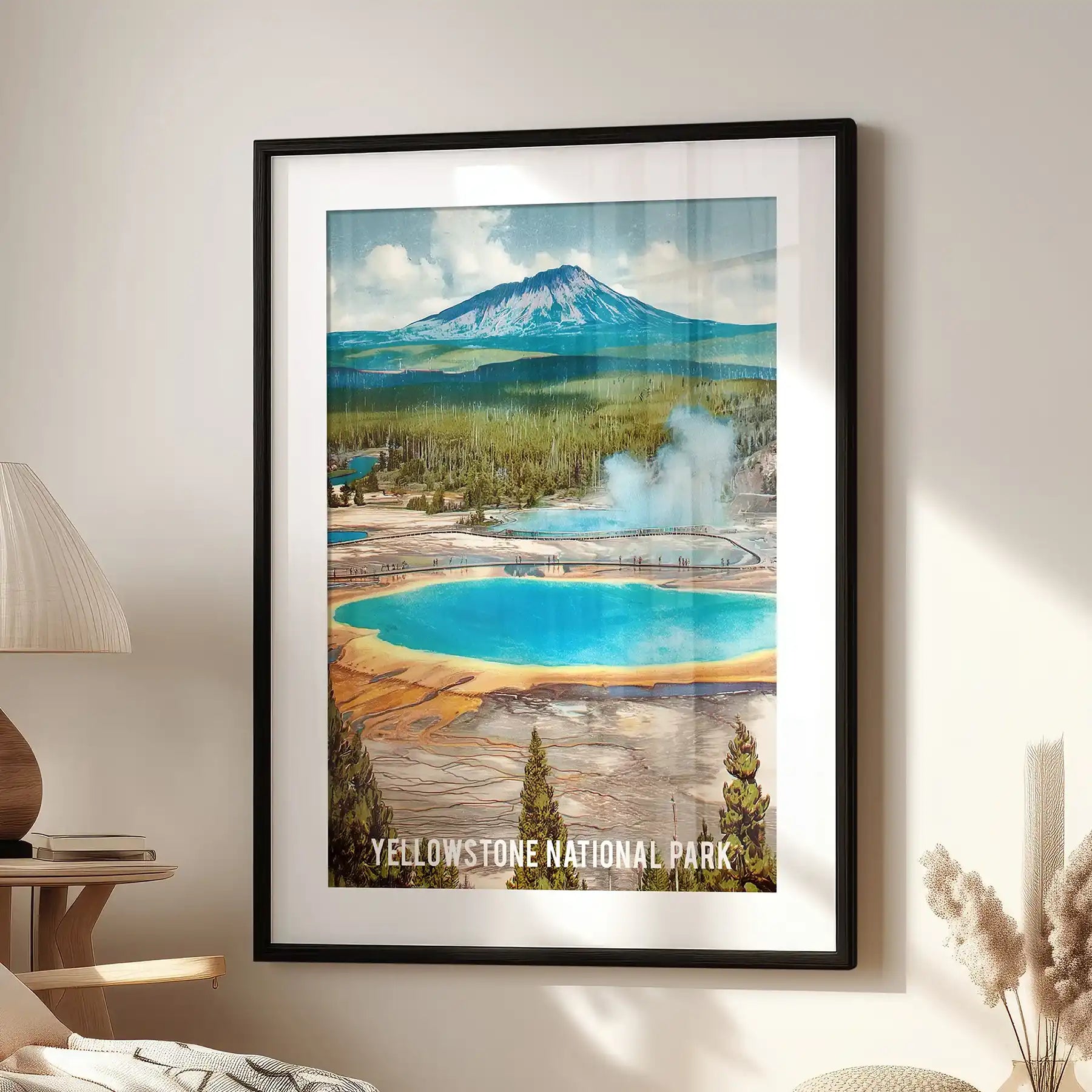 Framed with a white mat, this single-panel Grand Prismatic Spring art print anchors the family room above a comfortable lounge chair.