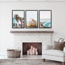Load image into Gallery viewer, Coastal Set of 3 Prints in Beige, Blue and Pink Tones. Ocean Beach with Surfboards, Cabins, Yellow Travel Van. Black Frames
