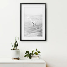 Load image into Gallery viewer, Black White Surfers on the Waves Wall Decor. Black Frame with Mat

