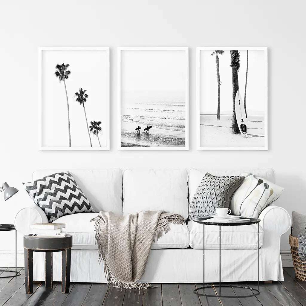 3 Piece Black White Ocean Surf Print Set. Surfers, Palm Trees, Surfboard on the Beach. White Frames