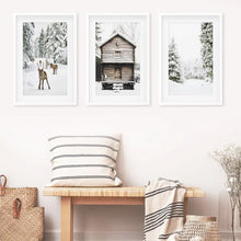 Load image into Gallery viewer, Christmas Theme Wall Art Set. Fawn, Log Cabin, ForestChristmas Theme Wall Art Set. Fawn, Log Cabin, Forest. White Frames with Mat
