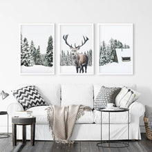 Load image into Gallery viewer, 3 Piece Christmas Wall Art. Forest, Log Cabin, Reindeer. White Frames
