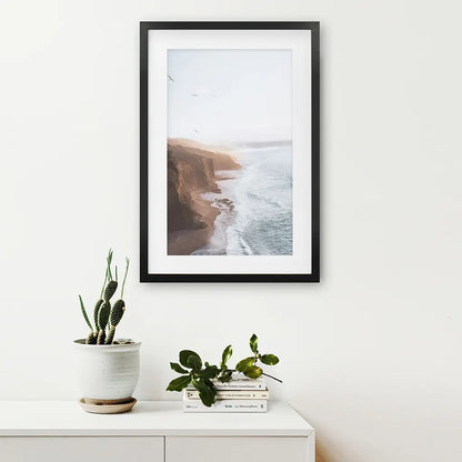 Coastal Cliff and Ocean Rocks Poster. Black Frame with Mat