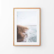 Load image into Gallery viewer, Coastal Cliff and Ocean Rocks Poster. Thin Wood Frame with Mat
