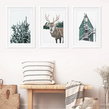 Load image into Gallery viewer, Rustic Christmas Wall Art Set. Trees, Deer, Green Log Cabin. White Frames with Mat
