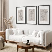 Load image into Gallery viewer, Pastel Botanical Wall Art Set of 3 Pieces. Gray and Beige. Black Frame. Living Room

