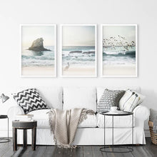 Load image into Gallery viewer, Ocean Beach with Rocks. Beige Blue Coastal Triptych
