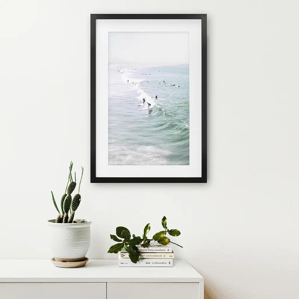 Pastel Miami Beach Print. Surfers and Ocean Waves. Black Frame with Mat
