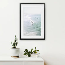 Load image into Gallery viewer, Pastel Miami Beach Print. Surfers and Ocean Waves. Black Frame with Mat
