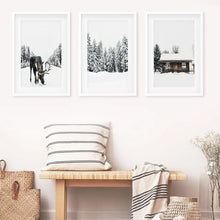 Load image into Gallery viewer, Winter Theme Triptych Photo Set. Moose, Log Cabin. White Frames with Mat
